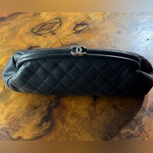 CHANEL Kisslock Clutch in Quilted Caviar Leather.